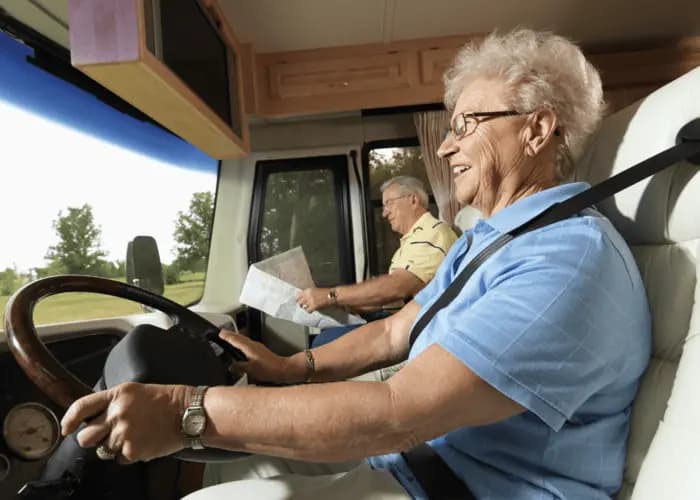 Older couple driving RV